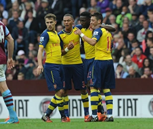 Aston Villa V Arsenal 2014-15 Prints: Mesut Ozil's Strike: Arsenal's Winning Moment vs. Aston Villa (2014-15)