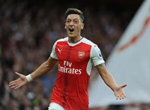 Images Dated 24th September 2016: Mesut Ozil's Stunner: Arsenal's Triumph over Chelsea (2016-17)