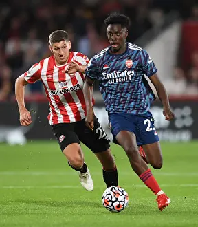 Brentford V Arsenal 2021-22 Prints: Midfield Battle: Lokonga vs Janelt - Brentford vs Arsenal Premier League Clash (2021-22)