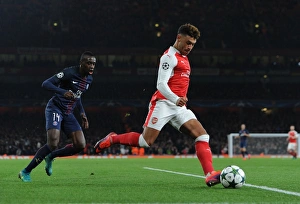 Arsenal V Paris Saint-Germain 2016-17 Prints: Midfield Showdown: Oxlade-Chamberlain vs