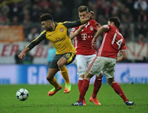 Bayern Munich V Arsenal 2016-17 Prints: Midfield Showdown: Oxlade-Chamberlain vs