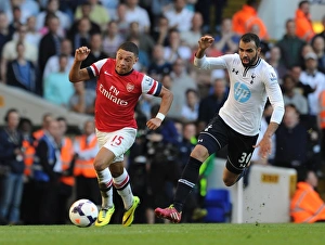 Tottenham Hotspur V Arsenal 2013-14 Prints: Midfield Showdown: Oxlade-Chamberlain vs. Sandro (Arsenal vs. Tottenham, 2013-14)