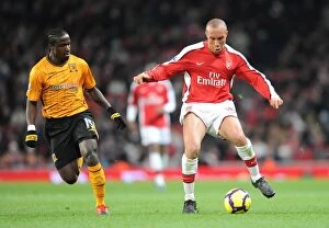 Images Dated 19th December 2009: Mikael Silvestre (Arsenal) Bernard Mendy (Hull). Arsenal 3: 0 Hull City