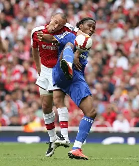 Arsenal v Chelsea 2008-09 Collection: Mikael Silvestre (Arsenal) Didier Drogba (Chelsea)
