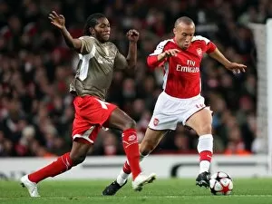 Arsenal v Standard Liege 2009-10 Collection: Mikael Silvestre (Arsenal) Dieudonne Mbokani (Liege)