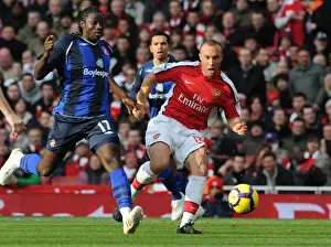 Arsenal V Sunderland 2009-10 Prints: Mikael Silvestre (Arsenal) Kenwyne Jones (Sunderland). Arsenal 2: 0 Sunderland