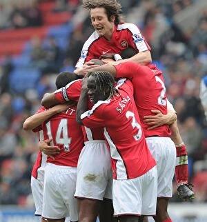 Wigan Athletic v Arsenal 2009-10 Gallery: Mikael Silvestre celebrates scoring the 2nd Arsenal goal with Theo Walcott