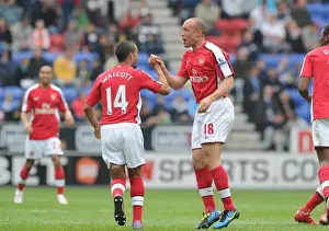 Wigan Athletic V Arsenal 2009-10 Prints: Mikael Silvestre and Theo Walcott: Celebrating Arsenal's 2nd Goal Against Wigan Athletic
