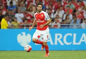 Images Dated 18th July 2015: Mikel Arteta in Action: Arsenal vs. Everton at 2015 Asian Trophy, Singapore