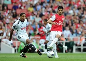 Arsenal v Swansea City 2011-12 Collection: Mikel Arteta (Arsenal) Ashley Williams (Swansea). Arsenal 1: 0 Swansea City