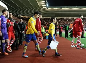 Images Dated 28th January 2014: Mikel Arteta (Arsenal) with the mascot. Southampton 2: 2 Arsenal. Barclays Premier League