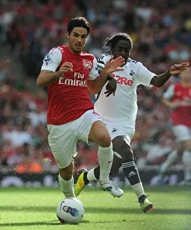 Mikel Arteta (Arsenal) Nathan Dyer (Swansea). Arsenal 1:0 Swansea City