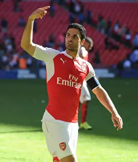 Mikel Arteta: Arsenal's Unyielding Captain in FA Community Shield Clash against Chelsea (2015)