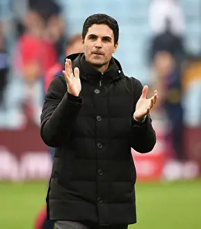 Mikel Arteta Celebrates with Arsenal Fans: Aston Villa vs. Arsenal FC, Premier League 2022-23