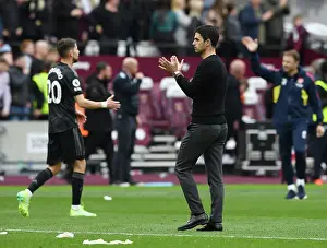 Mikel Arteta Celebrates Victory with Arsenal Fans: West Ham United vs. Arsenal, Premier League 2022-23