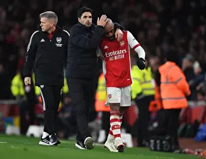 Arsenal V West Ham United 2021-22 Prints: Mikel Arteta Comforts Emotional Lacazette After Substitution: Arsenal's Heartfelt Moment vs West Ham United