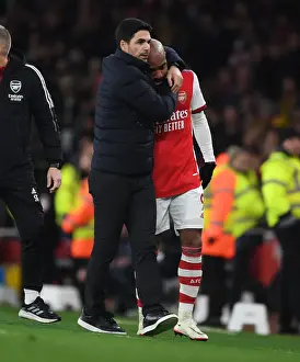 Arsenal V West Ham United 2021-22 Prints: Mikel Arteta Comforts Substituted Alexis Lacazette: An Emotional Moment at Arsenal vs West Ham United