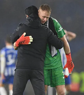 Brighton And Hove Albion V Arsenal 2021-22 Prints: Mikel Arteta Consoles Aaron Ramsdale: Emotional Moment after Arsenal's Win at Brighton & Hove Albion (2021-22)
