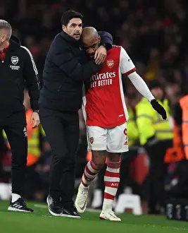 Arsenal V West Ham United 2021-22 Prints: Mikel Arteta Consoles Emotional Alexis Lacazette: A Heartfelt Moment at Arsenal vs West Ham United