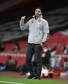 Mikel Arteta at Empty Emirates: Arsenal's Europa League Battle against Slavia Praha Amidst COVID-19 Restrictions