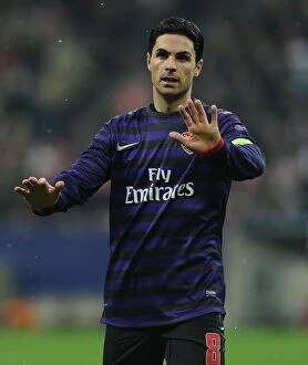 German Soccer League Collection: Mikel Arteta: Leading Arsenal Against Bayern Munchen in the UEFA Champions League (2012-13)