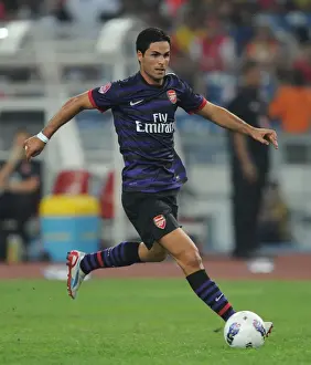 Mikel Arteta Leads Arsenal in 2012 Pre-Season Clash against Malaysia XI