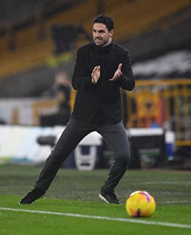 Wolverhampton Wanderers v Arsenal 2020-21 Collection: Mikel Arteta Leads Arsenal in Premier League Battle against Wolverhampton Wanderers (2020-21)