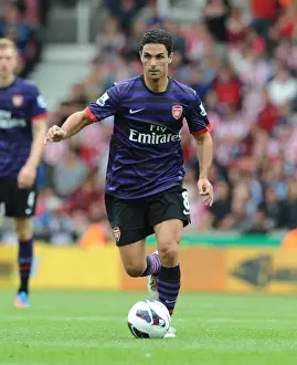 Mikel Arteta Leads Arsenal Against Stoke City in Premier League Clash (2012-13)
