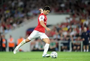 Arsenal V Olympiacos 2011-12 Prints: Mikel Arteta Leads Arsenal to Victory: 2-1 Over Olympiacos in UEFA Champions League Group F