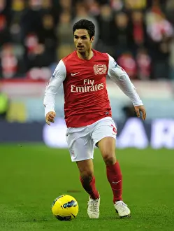 Wigan Athletic V Arsenal 2011-12 Prints: Mikel Arteta Leads Arsenal Against Wigan Athletic in Premier League Clash (2011-12)