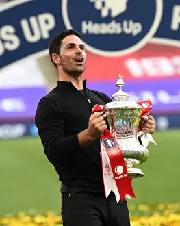 Mikel Arteta Lifts Empty FA Cup: Arsenal's Victory Over Chelsea in an Empty Wembley Stadium