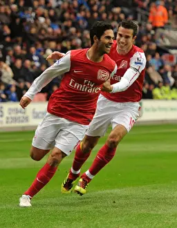 Mikel Arteta and Robin van Persie Celebrate Arsenal's Goal Against Wigan Athletic (2011-12)