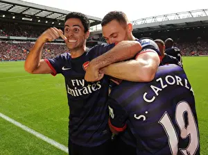 Mikel Arteta and Santi Cazorla Celebrate Arsenal's Goal at Anfield (2012-13)