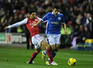 Wigan Athletic V Arsenal 2011-12 Prints: Mikel Arteta Tackles Jordi Gomez: Wigan Athletic vs Arsenal, Premier League 2011-12