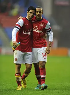 Wigan Athletic V Arsenal 2012-13 Prints: Mikel Arteta and Theo Walcott Celebrate Arsenal's Victory over Wigan Athletic (2012-13)