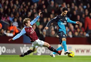 Aston Villa V Arsenal 2011-12 Prints: Mikel Arteta vs. Barry Bannan: Intense Battle in Aston Villa vs. Arsenal (2011-12)