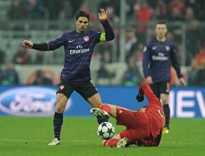 German Soccer League Collection: Mikel Arteta vs Toni Kroos: Battle in the UEFA Champions League - Bayern Munich vs Arsenal FC