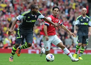Arsenal V Stoke City 2013-14 Prints: Mikel Arteta vs. Wilson Palacios: Intense Battle in Arsenal v Stoke City (2013-14)