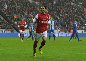 Wigan Athletic V Arsenal 2012-13 Prints: Mikel Arteta's Dramatic Winner: Arsenal's Triumph Over Wigan Athletic