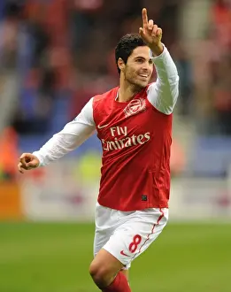 Wigan Athletic V Arsenal 2011-12 Prints: Mikel Arteta's Historic Goal: Arsenal's Triumph at Wigan Athletic (Premier League 2011-12)