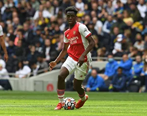 Tottenham Hotspur V Arsenal - The Mind Series 2021-22 Prints: The Mind Series: Tottenham vs Arsenal Clash (2021-22) - Albert Sambi Lokonga Focuses Amidst Intense Rivalry