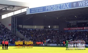 WBA V Arsenal 2010-11 Prints: Minutes of Silence for Japan Disaster at WBA vs. Arsenal (2011)