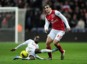 Swansea City V Arsenal 2011-12 Prints: Miquel Leaps Past Dyer: Swansea vs Arsenal, Premier League Clash (2011-2012)