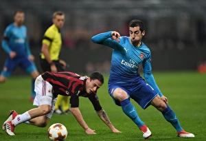 AC Milan V Arsenal 2017-18 Prints: Mkhitaryan Dances Past Calabria: Arsenal vs. AC Milan, UEFA Europa League Round of 16