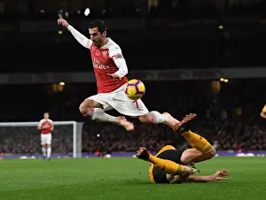 Arsenal V Wolverhampton Wanderers 2018-19 Prints: Mkhitaryan vs. Bennett: Intense Face-Off in Arsenal vs. Wolves Premier League Clash