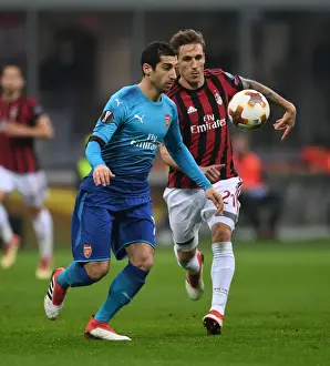 AC Milan V Arsenal 2017-18 Prints: Mkhitaryan vs Biglia: Battle in the Europa League - AC Milan vs Arsenal