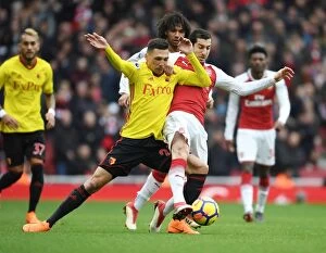 Images Dated 11th March 2018: Mkhitaryan vs Holebas: Intense Battle in Arsenal vs Watford Premier League Clash