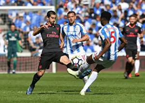 Huddersfield Town V Arsenal 2017-18 Prints: Mkhitaryan vs. Kongolo: Intense Battle for Ball Possession - Huddersfield Town vs