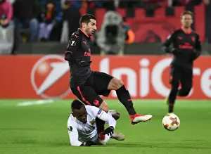 Ostersunds V Arsenal 2017-18 Prints: Mkhitaryan vs Mensah: Intense Clash in Ostersund's Europa League Showdown
