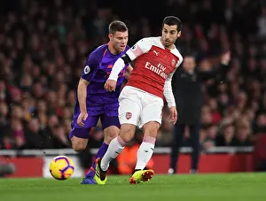 Arsenal V Liverpool 2018-19 Prints: Mkhitaryan vs Milner: A Footballing Battle in the Arsenal vs Liverpool Rivalry